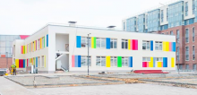 Фасад детского сада в «Английской миле» заиграл яркими красками